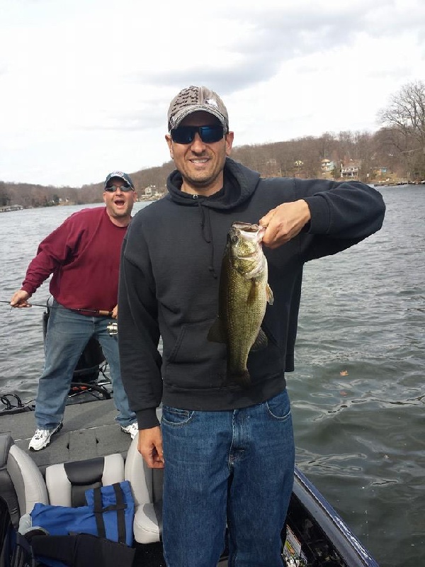 My buddy Mike, his boat near Mine Hill