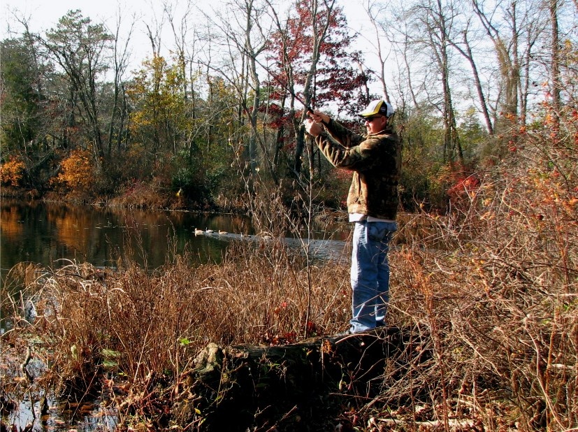 Dave getting my line out of the trees. near Newfield