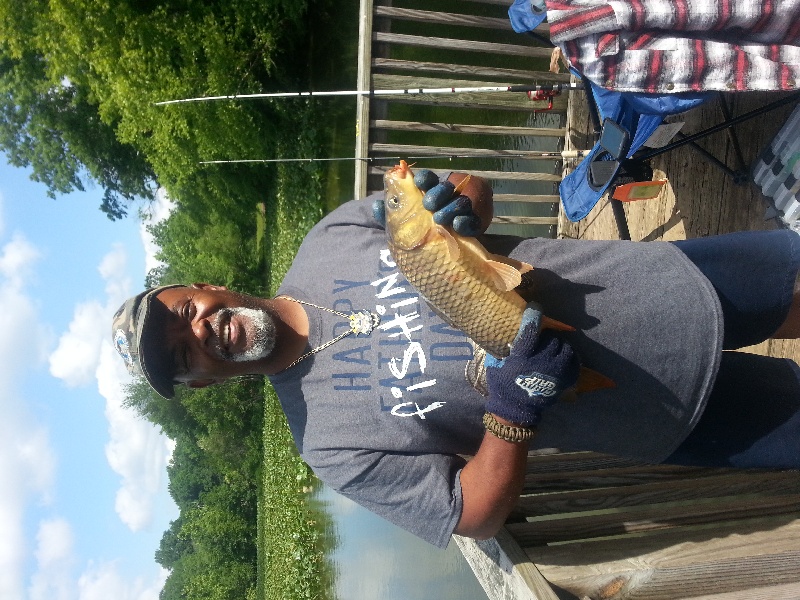 Dad with 4# Carp near Pemberton Township